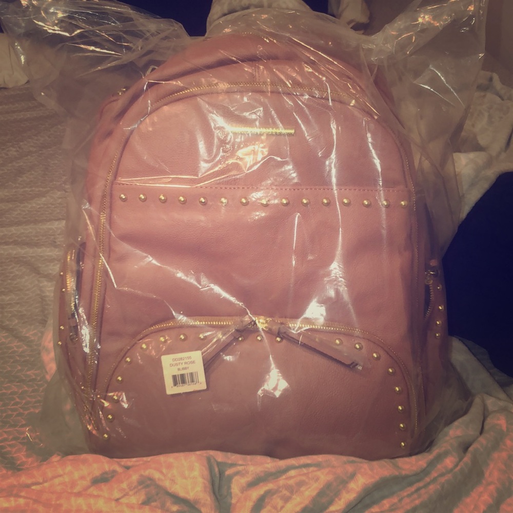 LARGE BACKPACK • great to use as a carry on